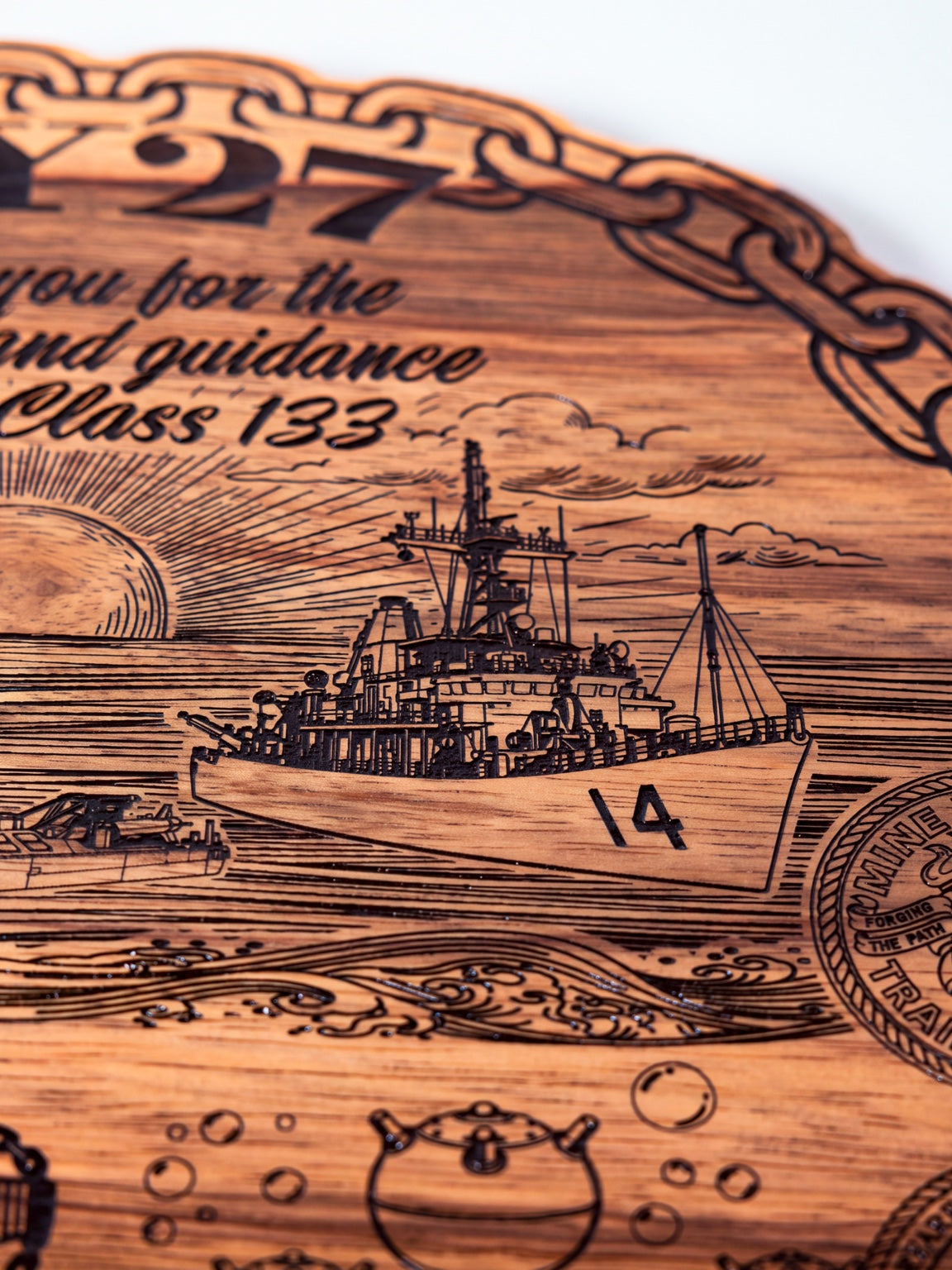 Engraved ship detail with acrylic paint fill
